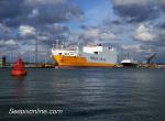 ID 6643 GRANDE AFRICA (1998/56642grt/IMO 9130949, Grimaldi-Cobelfret) dischaging the UK's first consignmnet of Ford Focus cars after having arrived at 4am in Southampton, England for her maiden call.